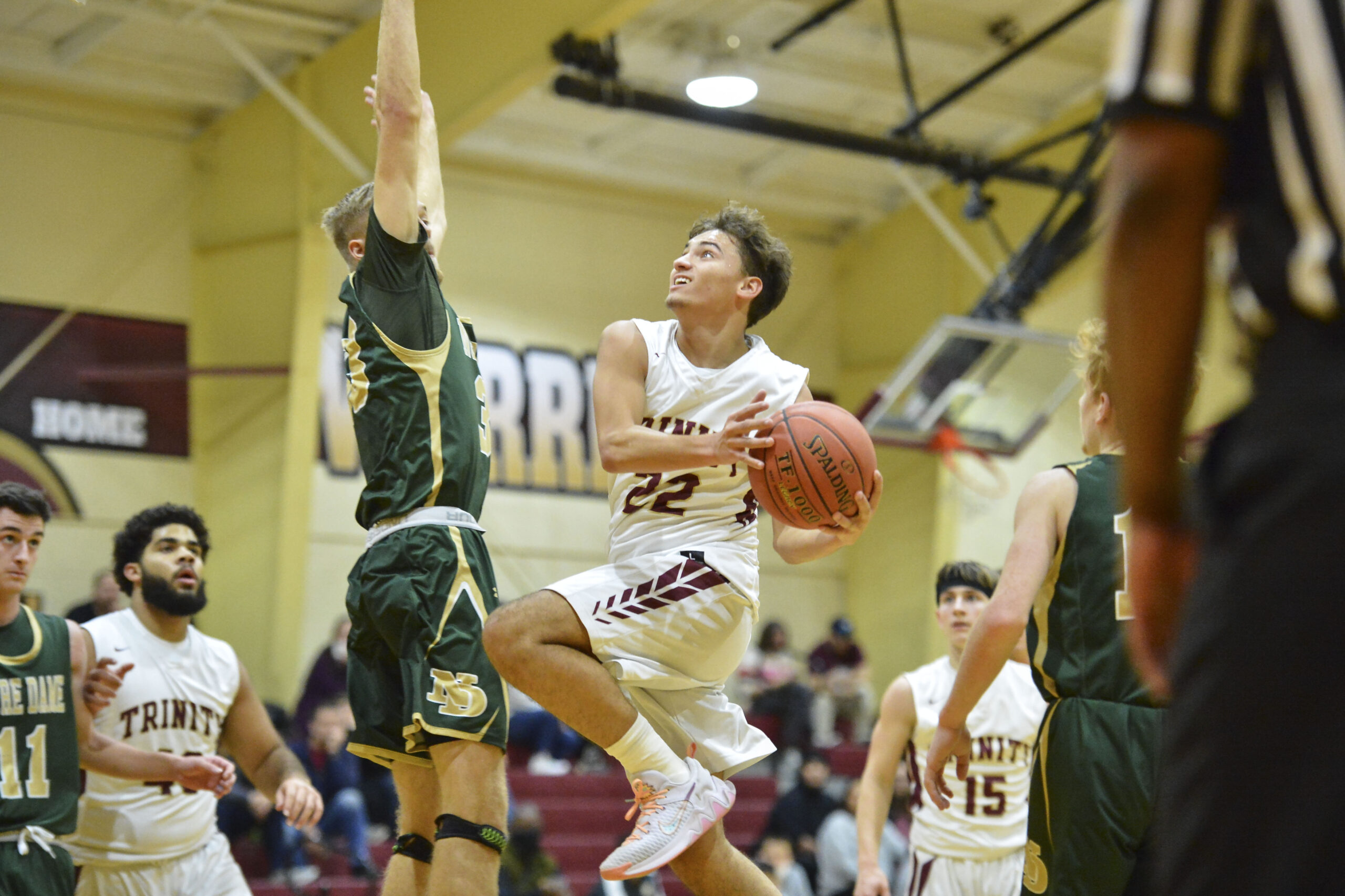 Notre Dame downs Trinity in boys' hoops; No. 4 UHS wrestling team takes down No. 3 Wheeling Park